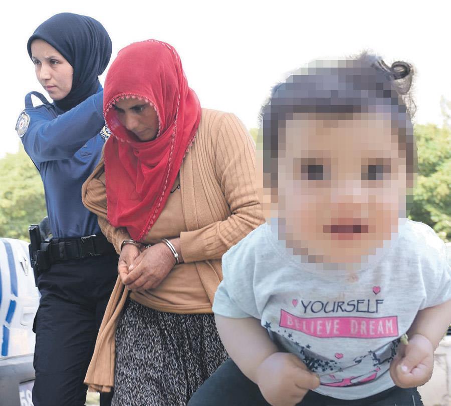 Büşra bebeğin annesi polis eşliğinde