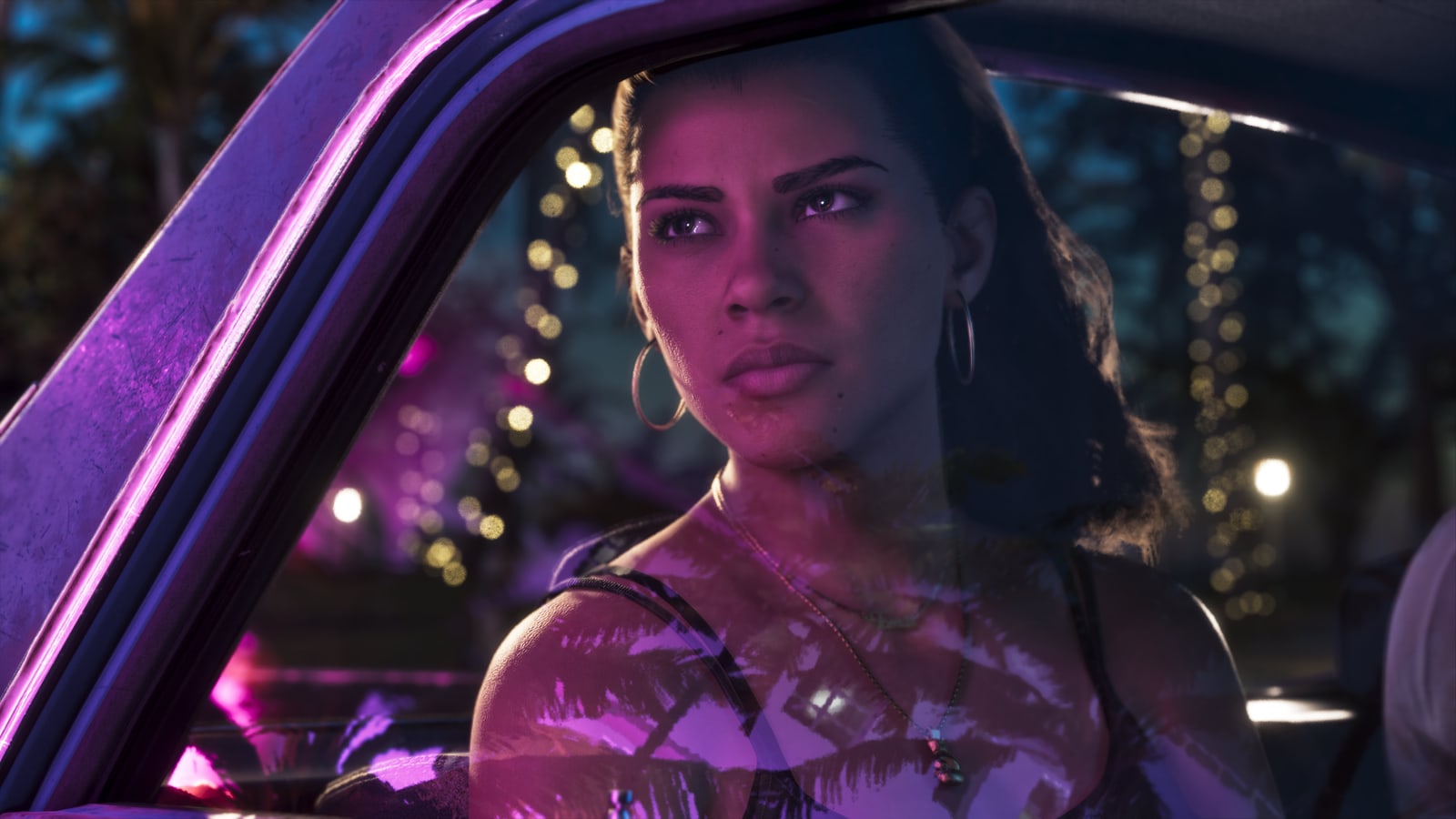 GTA 6 ekran görüntüsü: Lucia gece arabanın direksiyonunda, neon ışıklar altında